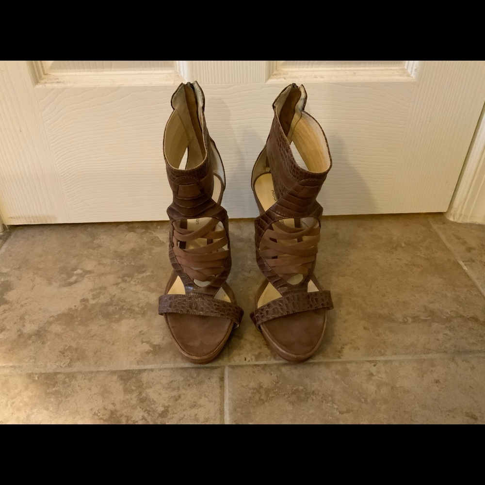 Alexandre Birman tan platform sandals.